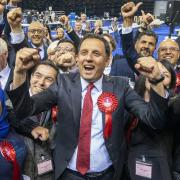 Anas Sarwar celebrates with Labour candidates at the vote count in Glasgow - where his party narrowly failed to win. Photo: PA