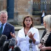 Mary Lou McDonald (centre), speaks to the media alongside Conor Murphy (left) and Michelle O'Neill (right), after meeting with the PM