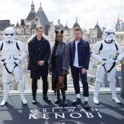 Moses Ingram (centre), Ewan McGregor (right), and Hayden Christiansen (left) pose with stormtroopers ahead of the release of Obi-Wan Kenobi. Photo: PA