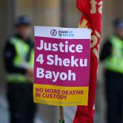 A placard outside Capital House in Edinburgh at the start of a public inquiry into the death of Sheku Bayoh. Bayoh died in May 2015 after he was restrained by officers responding to a call in Kirkcaldy, Fife.Picture date: Tuesday May 10, 2022. PA Photo.