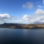 Aerial view of the island of Eigg where sustainable tourism is already rooted in the community