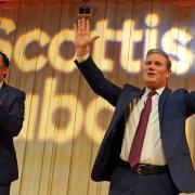 UK and Scottish Labour leader Keir Starmer (right) is applauded by 'Scottish Labour leader' Anas Sarwar. Photo: PA