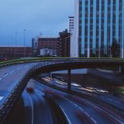 The M8 cuts through Glasgow between the city's centre and the West End. Photo by Eilis Garvey on Unsplash