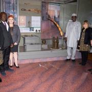 Glasgow life and the Nigerian delegation next to the Benin bronzes
