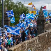 All Under One Banner march for independence from Stirling old bridge (pictured) to Bannockburn. ..Photograph by Colin Mearns.25 June 2022.