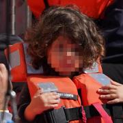 A child was among those on a boat intercepted by the UK