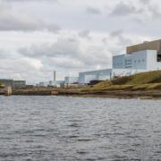 A leak from a substation at Torness nuclear power station has led to people being warned to avoid nearby waters