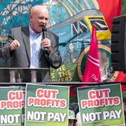 RMT general secretary, Mick Lynch, speaks at a rally outside Kings Cross station. Photograph: PA