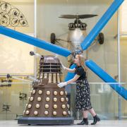 Liv Mullen with a Dalek during a photocall at the National Museum of Scotland in Edinburgh for the announcement of the forthcoming Doctor Who Worlds of Wonder exhibition