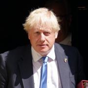 Boris Johnson has resigned as Tory leader but will stay on as prime minister until September. Photo: PA