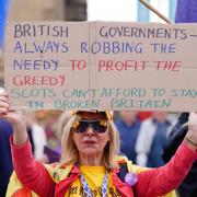 A protestor at the Tory hustings in Perth. Picture: PA