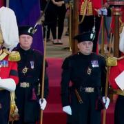 Alister Jack, left in black, and Ben Wallace, right in black were standing vigil on Thursday in front of the Queen's coffin