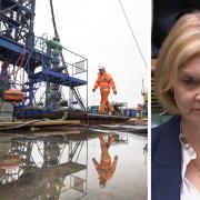 A worker at the Cuadrilla fracking site in Preston New Road, Little Plumpton, Lancashire, and Prime Minister Liz Truss