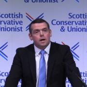 Douglas Ross speaking at the Tory conference in Birmingham