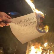 An image shared on Twitter by one activist who burned a copy of the Act of Union