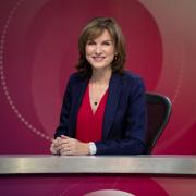 Fiona Bruce will step back from her role with a domestic abuse charity after accusations she minimised domestic violence