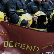 Firefighters at a protest outside Westminster last summer