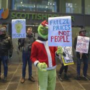 A demonstration against astronomical rises in energy bills was held outside Scottish Power HQ with protesters claiming energy giants were ruining Christmas