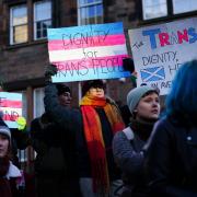 People take part in a demonstration for trans rights  in Edinburgh