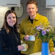 Eilidh Cunningham and Andrew Flynn with one of their innovative origami letterbox vases, which have been snapped up by Bloom & Wild