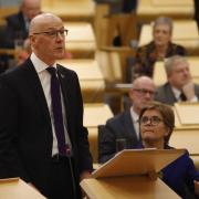 John Swinney has pledged the Scottish Government's budget will provide 'stability'