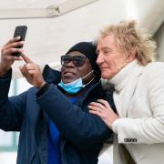 Sir Rod Stewart takes a selfie with Omarie Ryan, who received an MRI scan on his left knee