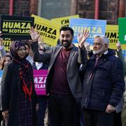 Humza Yousaf with parents Shaaista and Muzaffar at a campaign event in Glasgow