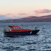 The scene in East India Harbour, Greenock after a rescue operation was launched after a tugboat with two people on board capsized in the River Clyde