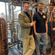 Co-owners Jon (left) and Victoria Erasmus (right) with Master Distiller/Brewer Bruce Smith (centre) at the opening of Uile-bheist Distillery, the first distillery to open in Inverness for 130 years