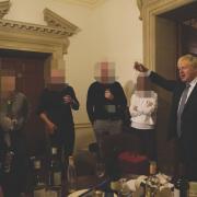 Boris Johnson (right) at an event in No 10 when Covid rules were in place