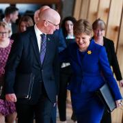 Deputy First Minister John Swinney (left) and outgoing First Minister Nicola Sturgeon arrive for her last First Minster's Questions