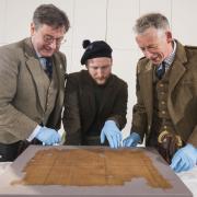 John McLeish, James Wylie and Peter MacDonald with the Glen Affric tartan