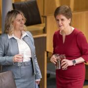 Scottish Labour's Pauline McNeill (left) with Nicola Sturgeon in the debating chamber of the Scottish Parliament