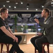 Elon Musk speaking to BBC journalist James Clayton in Twitter HQ