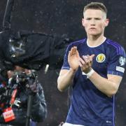 Scotland's Scott McTominay applauds after he helped his team beat Spain 2-0 at Hampden