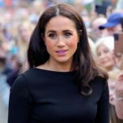 Meghan Markle has rejected a suggestion that she is missing the King's coronation over a letter she