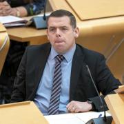 Douglas Ross couldn't resist a quip about SNP finances at FMQs
