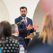 Humza Yousaf speaks during an anti-poverty summit at Dovecot Studios, Edinburgh