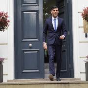 Rishi Sunak appeared to remain calm despite his party suffering major losses in England's local elections