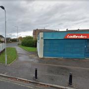 The attack took place outside the Ladbrokes betting shop on Duart Crescent