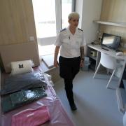 A prison officer inside a room within Iris House at HMP Stirling, Scotland's new women's prison