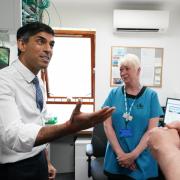 Rishi Sunak speaking to staff during a visit to Rivergreen Medical Centre in Nottingham
