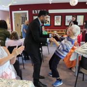 Humza Yousaf dances with Glasgow care home resident