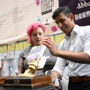 Rishi Sunak faced heckles as he pulled a pint on a beer festival visit