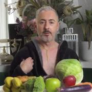 Alan Cumming at a photoshoot with Peta to promote veganism