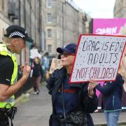 A protester outside of the Drag Queen Story Hour event in Edinburgh