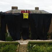 Greenpeace activists on the roof of Prime Minister Rishi Sunak's house in Richmond, North Yorkshire
