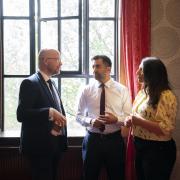 First Minister Humza Yousaf with chief of staff Colin McAllister (left) and wife Nadia