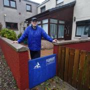John Stewart with his flood defence outside his home on River Street, Brechin