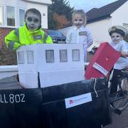 Iagan MacLeod, Charlotte Wilson and Danaidh Wilson dressed up as the ferry's 'skeleton crew'